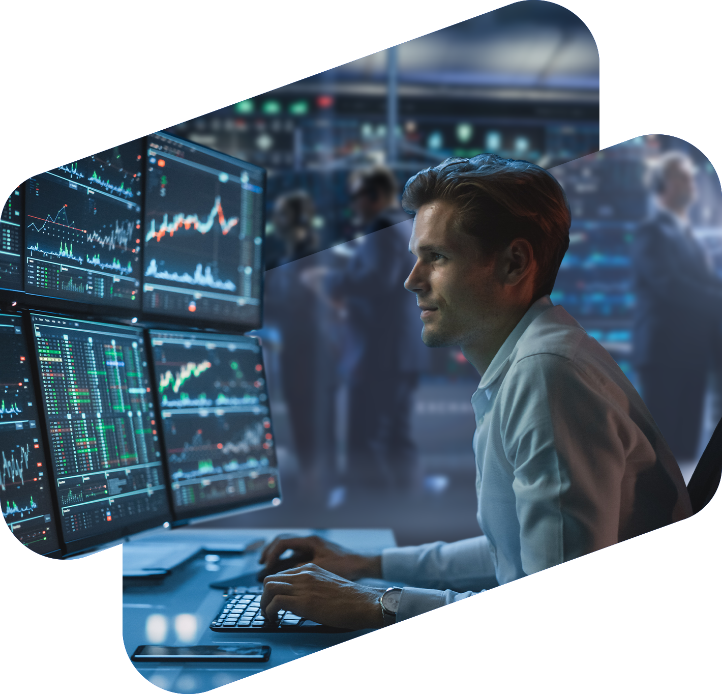 Professional trader at a multi-monitor desk